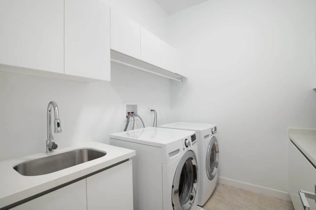 Modern laundry room remodeling in San Antonio TX with custom cabinets