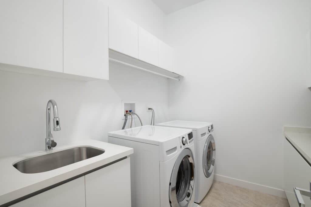 Modern laundry room remodeling in San Antonio TX with custom cabinets